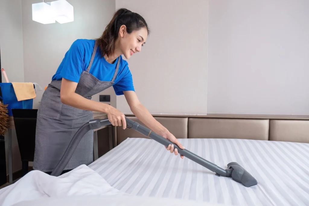 hotel-cleaning-staff-uses-a-mop-to-clean-the-livin-2024-04-02-22-06-07-utc